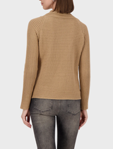Monari's cognac rib sweater, a basic yet elegant piece perfect for layering in casual settings.