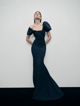 Elegant navy jade gown with a flowing silhouette, perfect for formal occasions and evening events.