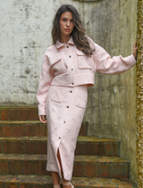 Pink Tweedle Bow Jacket with a unique bow accent, offering a fashionable and whimsical addition to your wardrobe.