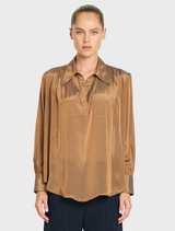 Mela Purdie Atrium Blouse in Syrup, showcasing a luminous chiffon fabric with a crisp collar and gathered sleeve details.
