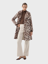Close-up of a chocolate beige Claudette coat, highlighting its buttons and stitching details.