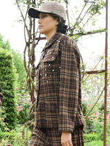 Stylish chocolate check shacket, featuring a button closure and a relaxed silhouette, perfect for layering.