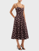 Vivianne Strap Midi Dress in a stylish polka dot print, combining comfort and fashion for versatile wear.
