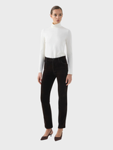 A pair of chocolate-colored velvet jeans, highlighting the luxurious fabric and stylish design.