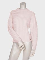 Chunky knit pullover in a soft blush color, ideal for casual outfits and comfortable wear.