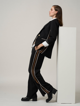 Black Cipher Blazer displayed on a hanger, featuring a tailored fit and sleek design suitable for formal occasions.