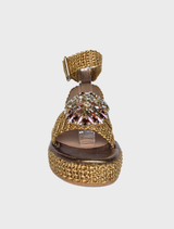 Claire Sandal in bronzo, designed with a contemporary look and comfortable fit, ideal for summer outings or events.