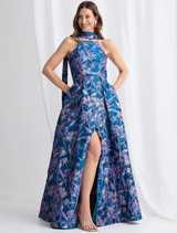 Navy and pink Clara dress displayed on a mannequin, showcasing its elegant design and color combination.