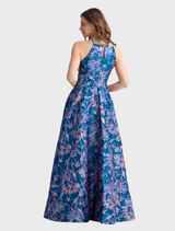 Close-up of the navy and pink Clara dress, emphasizing the intricate details and vibrant colors.