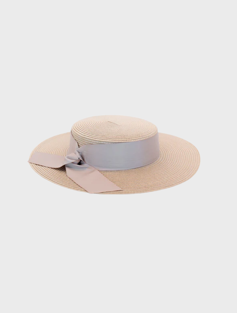 Elegant Clarke Racewear boater in white and nude, showcasing a wide brim ideal for sun protection and stylish outings.
