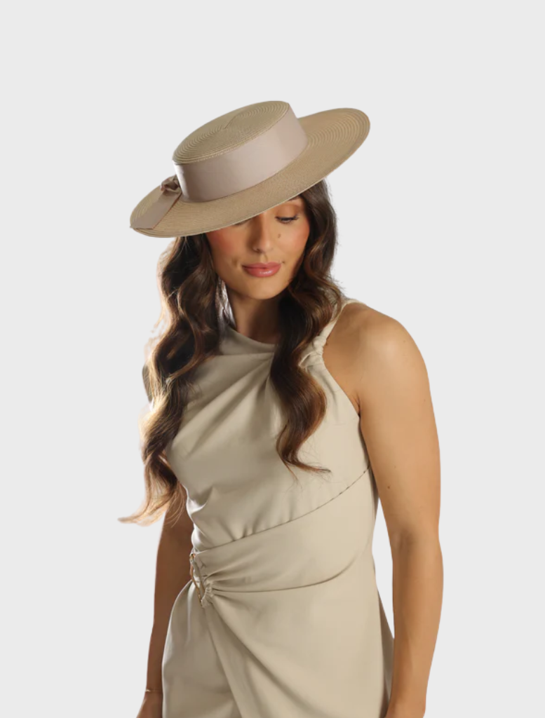 Clarke Racewear boater hat in white and nude, featuring a wide brim and elegant design for stylish sun protection.