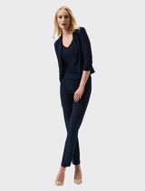 Classic midnight blue blazer, tailored fit, featuring notched lapels and two front pockets. Ideal for formal occasions.