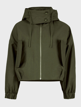 Casual khaki off-duty jacket draped on a chair, illustrating its easygoing style perfect for leisure activities.