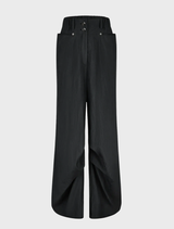 Black trousers characterized by a rusty, aged look, offering a unique fashion statement.
