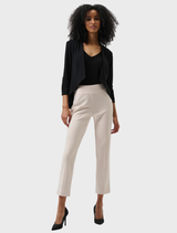 Classic black tuxedo overpiece, elegant design suitable for formal occasions.