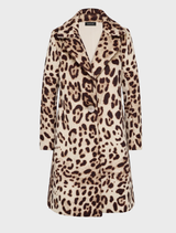 A chocolate beige Claudette coat hanging on a rack, showcasing its elegant design and fabric texture.