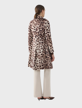 A rich chocolate brown paired with soft beige, evoking a cozy and elegant atmosphere.