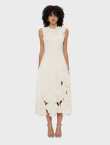 Sleeveless midi dress in vanilla with intricate appliqué detailing, perfect for warm weather occasions.