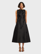 Sleeveless ebony midi dress by Cleo Petal, featuring a fitted bodice and flowing skirt for a stylish look.