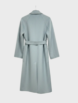 Noor coat, designed with a chic aesthetic, combines functionality and fashion for a versatile outerwear option.