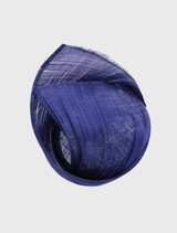 Cobalt blue racewear fascinator featuring a curving design on a headband, perfect for adding flair to formal outfits.