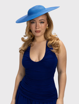 Stylish cobalt blue hat with a structured shape and fitted headband, ideal for race day or formal occasions.