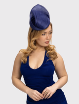 Sculptural cobalt blue fascinator on a minimalist headband, ideal for formal events and race day outfits.