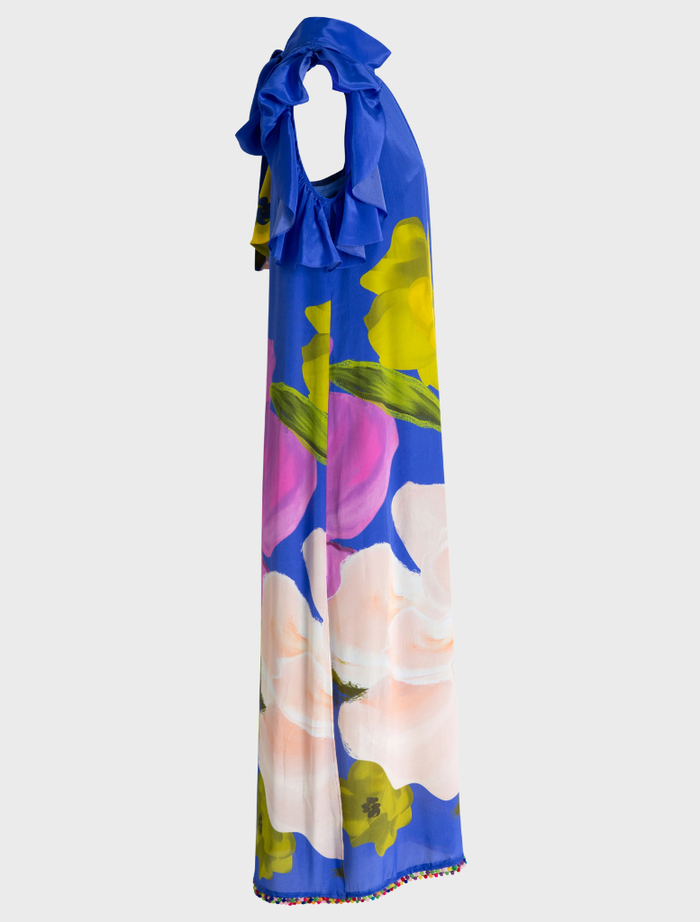 Modern Romance Dress featuring a cobalt background adorned with vibrant, colorful floral patterns.