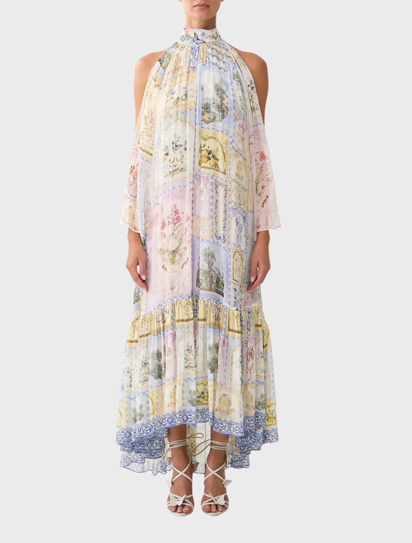 Cold shoulder long dress featuring a botanical print, perfect for elegant occasions and warm weather events.