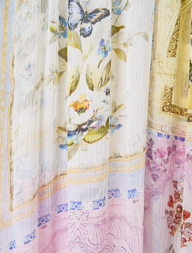 Elegant cold shoulder long dress adorned with a vibrant botanical pattern, ideal for formal events and summer gatherings.