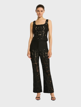 Elegant black crop top, the Colette Bustier, adorned with delicate lace detailing for a sophisticated appearance.