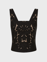 Black crop top with lace detailing, named Colette Bustier, showcasing a stylish and elegant design.