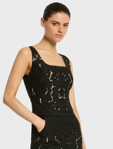 Stylish black crop top named Colette Bustier, adorned with lace detailing for a trendy and sophisticated appearance.