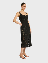 Stylish black Colette dress with a tailored fit and sophisticated elements, suitable for upscale occasions.