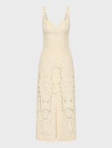 Colette Dress in Buttermilk color, featuring a flowing design and elegant silhouette suitable for various occasions.