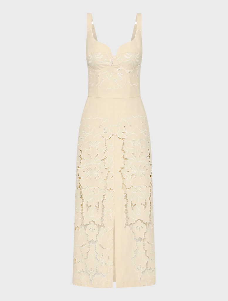 Colette Dress in Buttermilk color, featuring a flowing design and elegant silhouette suitable for various occasions.