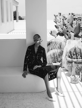 Elegant Colette Jacket in a soft black hue, perfect for layering in any season.