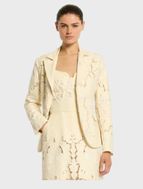 Elegant Colette Jacket in a soft buttermilk hue, perfect for layering in any season.