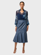 Colette's Moonlit Batik blouse in viscose chiffon, showcasing a chic shirred collar design.