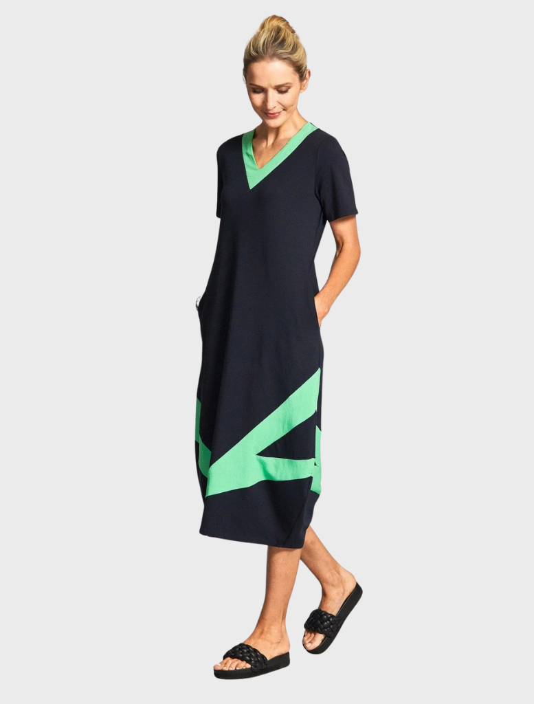 A chic v-neck dress in black and green hues.