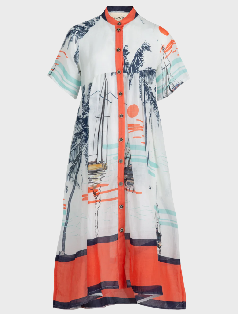 A woman's skirt displaying a sailboat motif, referred to as "Don't Make Waves Dress - Marina.