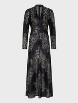 Long-sleeve maxi dress in dark ink and cream, featuring a flowing silhouette and elegant design.
