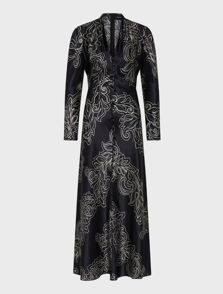 Long-sleeve maxi dress in dark ink and cream, featuring a flowing silhouette and elegant design.