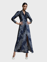 Elegant long-sleeve maxi dress in dark ink and cream, designed for a sophisticated and chic look.