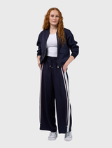 Navy and white bomber jacket with ribbed hem, cuffs, collar, zip front, and contrast tape detail on back and pockets.