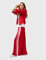 Poppy and blush bomber jacket featuring ribbed hem, cuffs, collar, zip front, and contrast tape detail on back and pockets.
