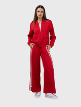 Bomber-style jacket in poppy and blush, with ribbed hem, cuffs, collar, zip closure, and contrast tape detail on back and pockets.