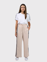 Wide leg pant in stone and navy with elasticated waist, adjustable ties, and contrast tape detail on side seams.