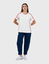 White and blush cotton tee featuring a round neckline and contrast tape accents on the sleeves and side seams.