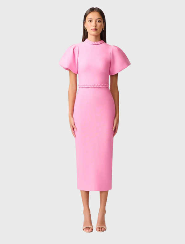 Pink midi dress made from stretchy fabric, showcasing a comfortable and stylish design suitable for various occasions.